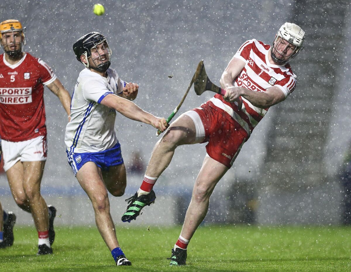 Cork’s Brion Saunderson clears from Waterford’s Charlie Treen. Picture: INPHO/Ken Sutton