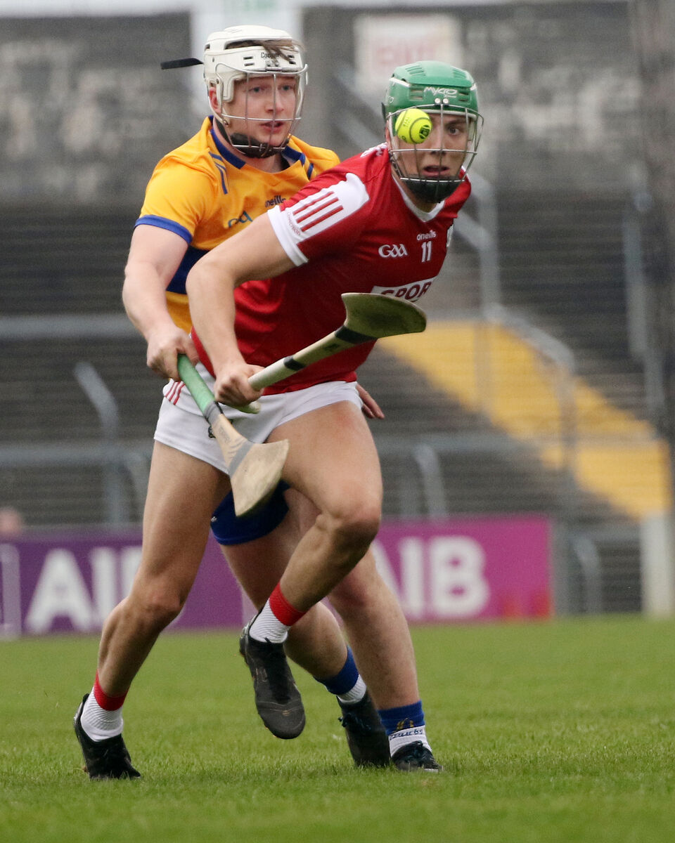 Ben Cunningham keeping an eye on the sliotar against Oisin Clune. Picture: Brendan Gleeson
