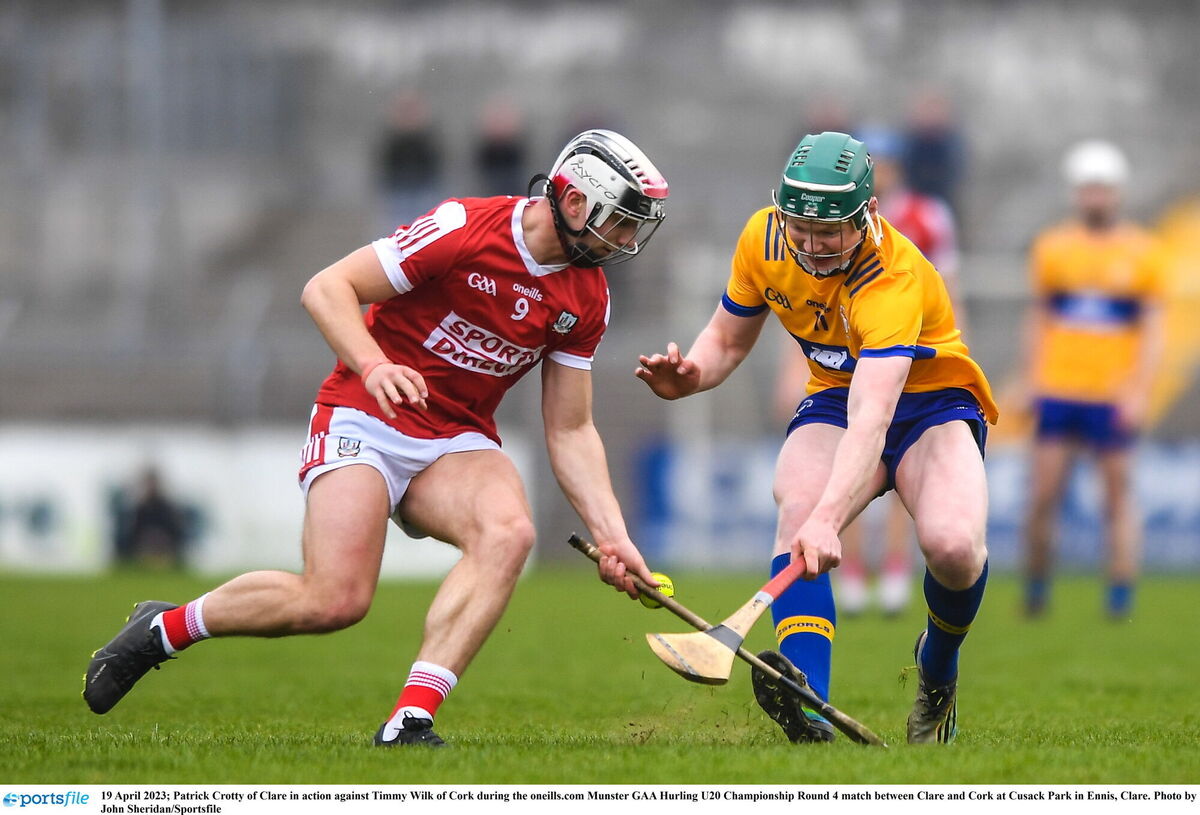 Patrick Crotty of Clare in action against Timmy Wilk of Cork. Picture: John Sheridan/Sportsfile