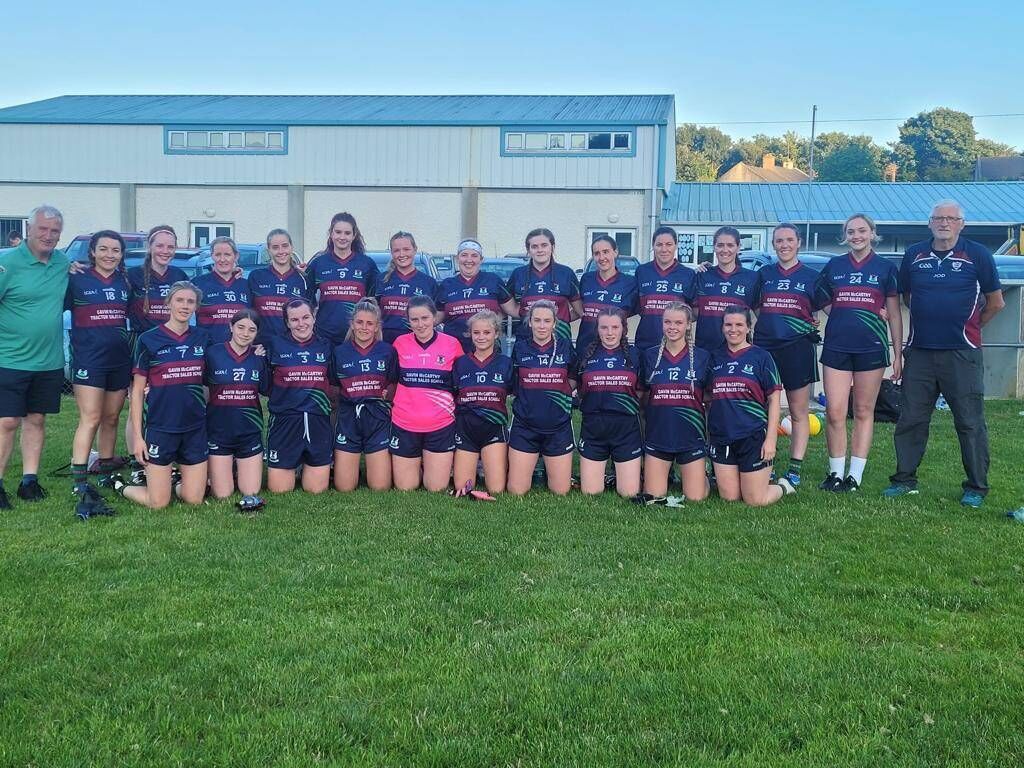 The Muintir Gabriels junior football team pictured with their coaches Joe O'Driscoll and Fergus Minihane.