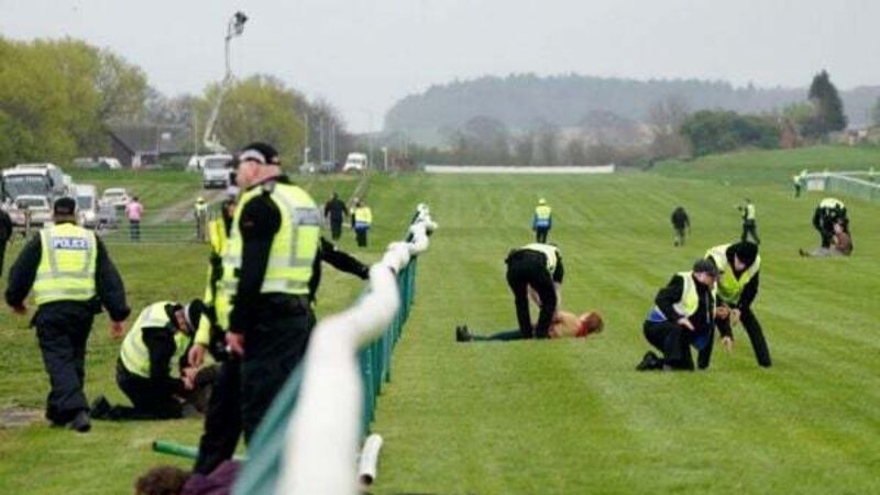 Number of arrests made after protesters try to stop Scottish Grand National