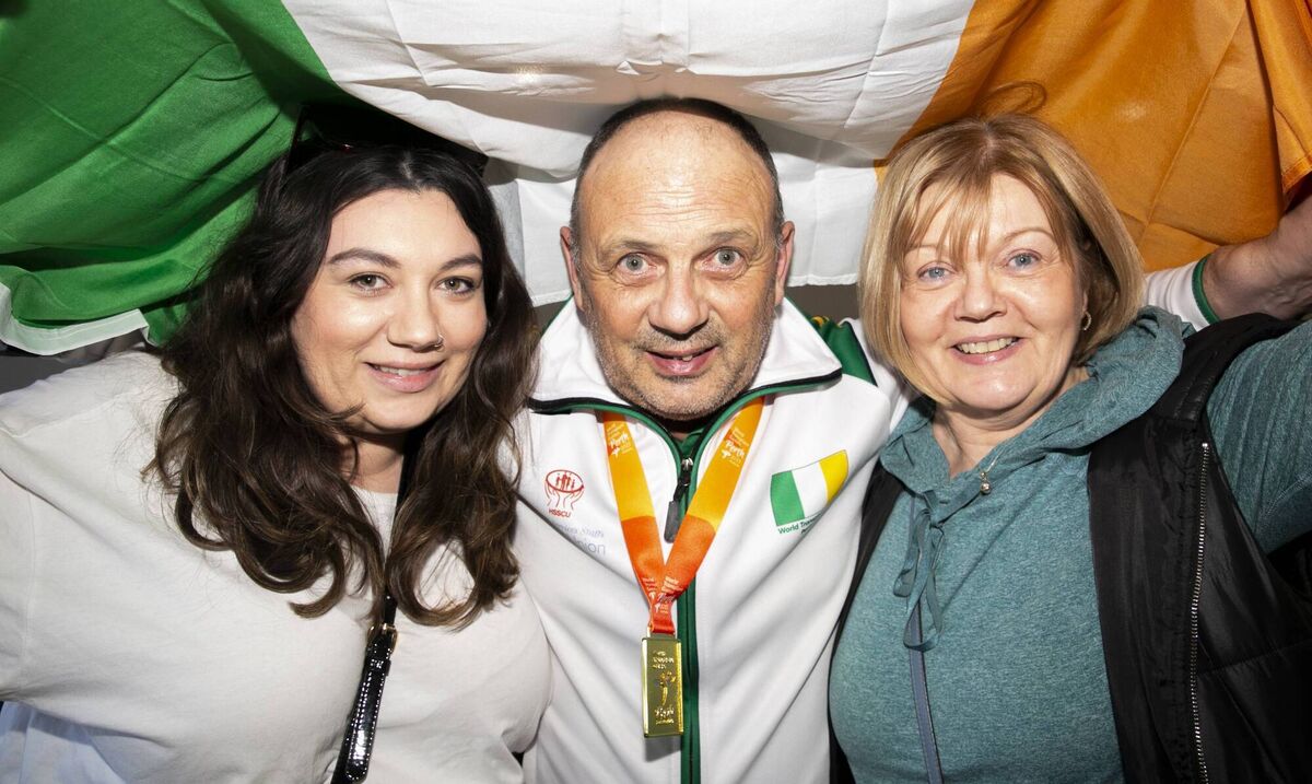Athlete Pat O Sullivan with (L to R) daughter Carol O Sullivan and wife Helen O Sullivan all from Mallow after he returned home to Dublin Airport following World Transplant Games in Perth, Australia.Photo: Gareth Chaney
