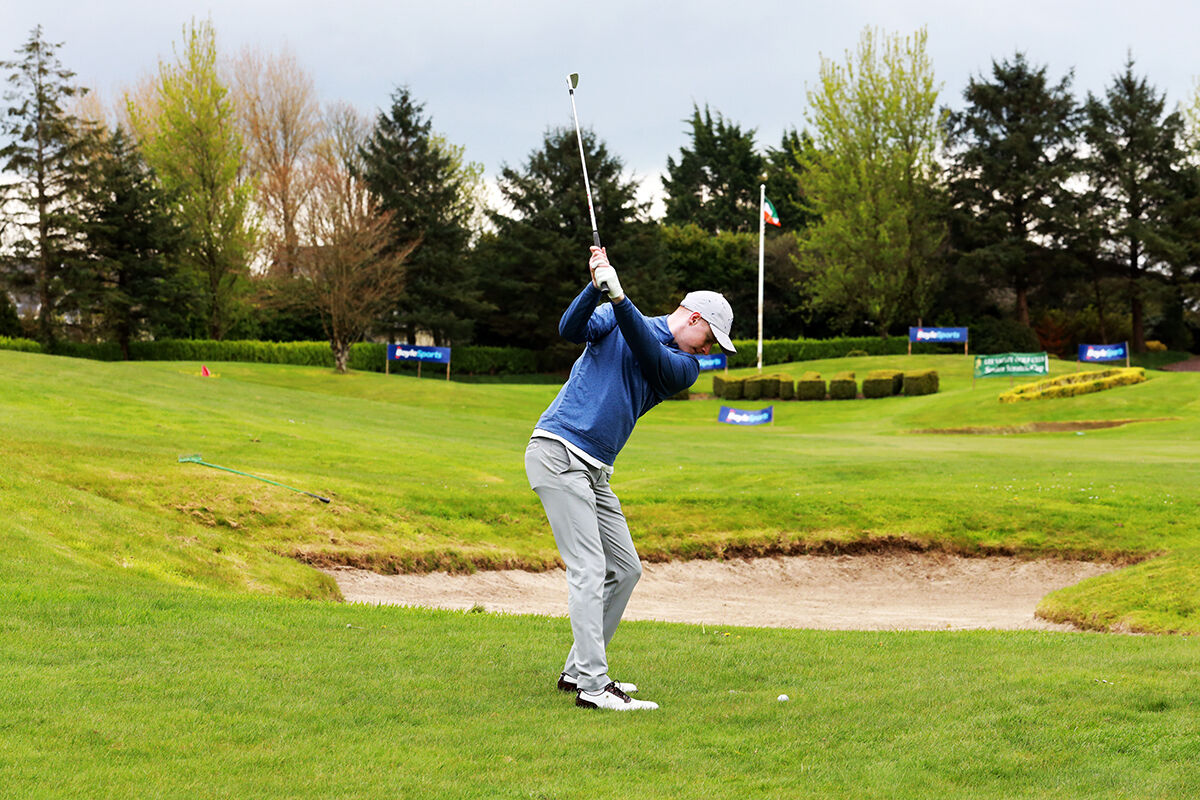 Robbie Walsh (Douglas) playing his approach to the 18th green. Picture: Niall O'Shea
