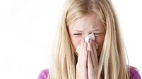 Preteen Caucasion Girl Has the Flu or Allergies Closeup Headshot