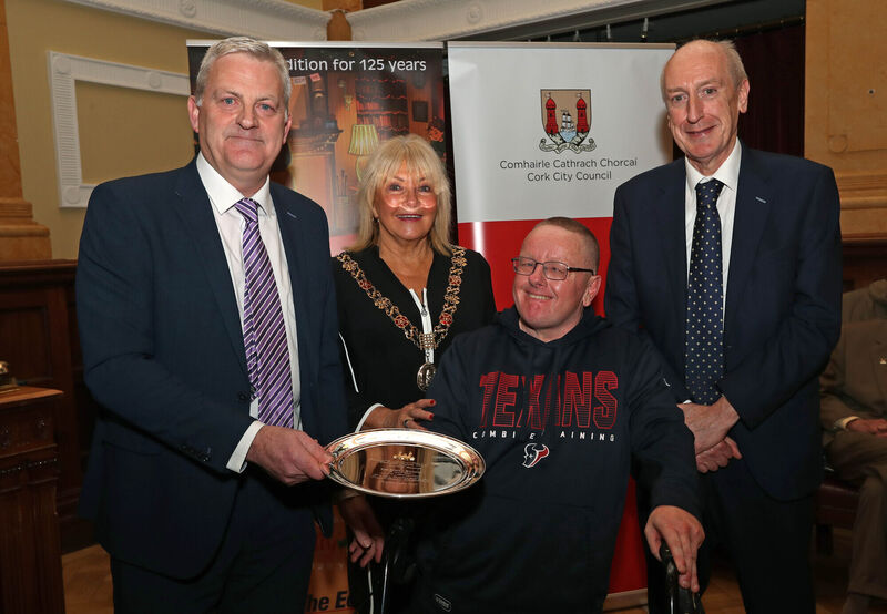  Lord Mayor Cllr Deirdre Forde with John Dolan, Assistant Editor/Features Editor at The Echo, Dave Hogan, Echo Boy and Maurice Gubbins, Editor The Echo attend the 2022 Holly Bough Civic Reception at City Hall, Cork.