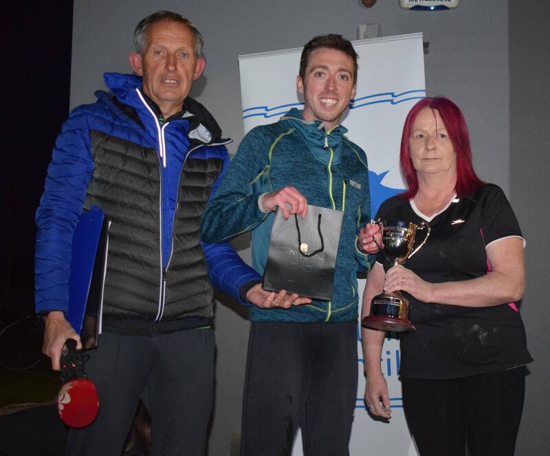 Ryan Creech, winner of the Ballintotis road race, receiving the Dominic Knowles Memorial Cup from Noreen Knowles. Also pictured is John Cashman, race organiser. Picture: John Walshe 