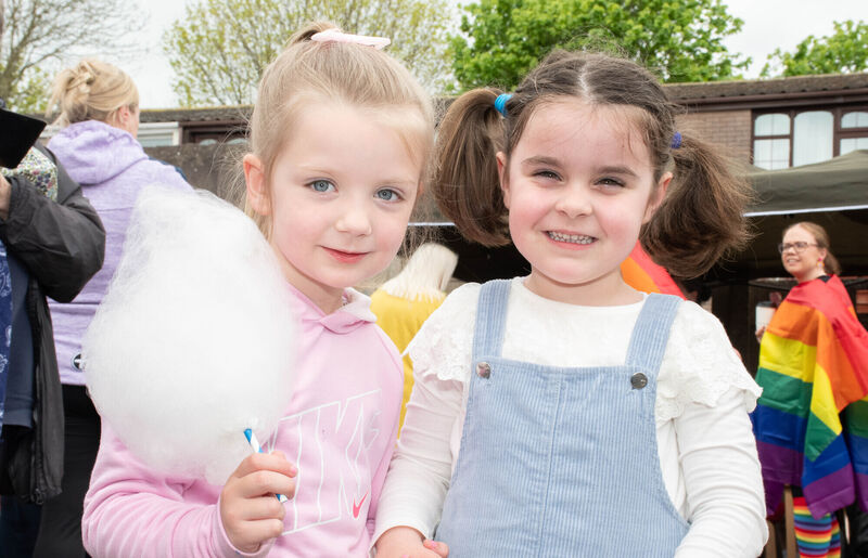  Marija Aspnjan and Izzy Madden about to share a candyfloss at the Togher Family Centre fun day. Pic: Howard Crowdy