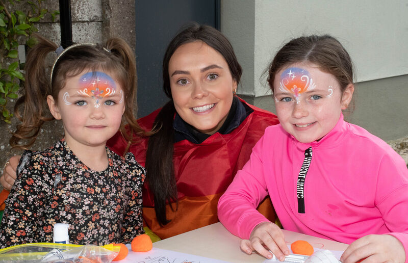 Aisling Murphy, centre, doing some craft work with Amelia Falvey and Faye Nolan at the Togher street party. Pic: Howard Crowdy