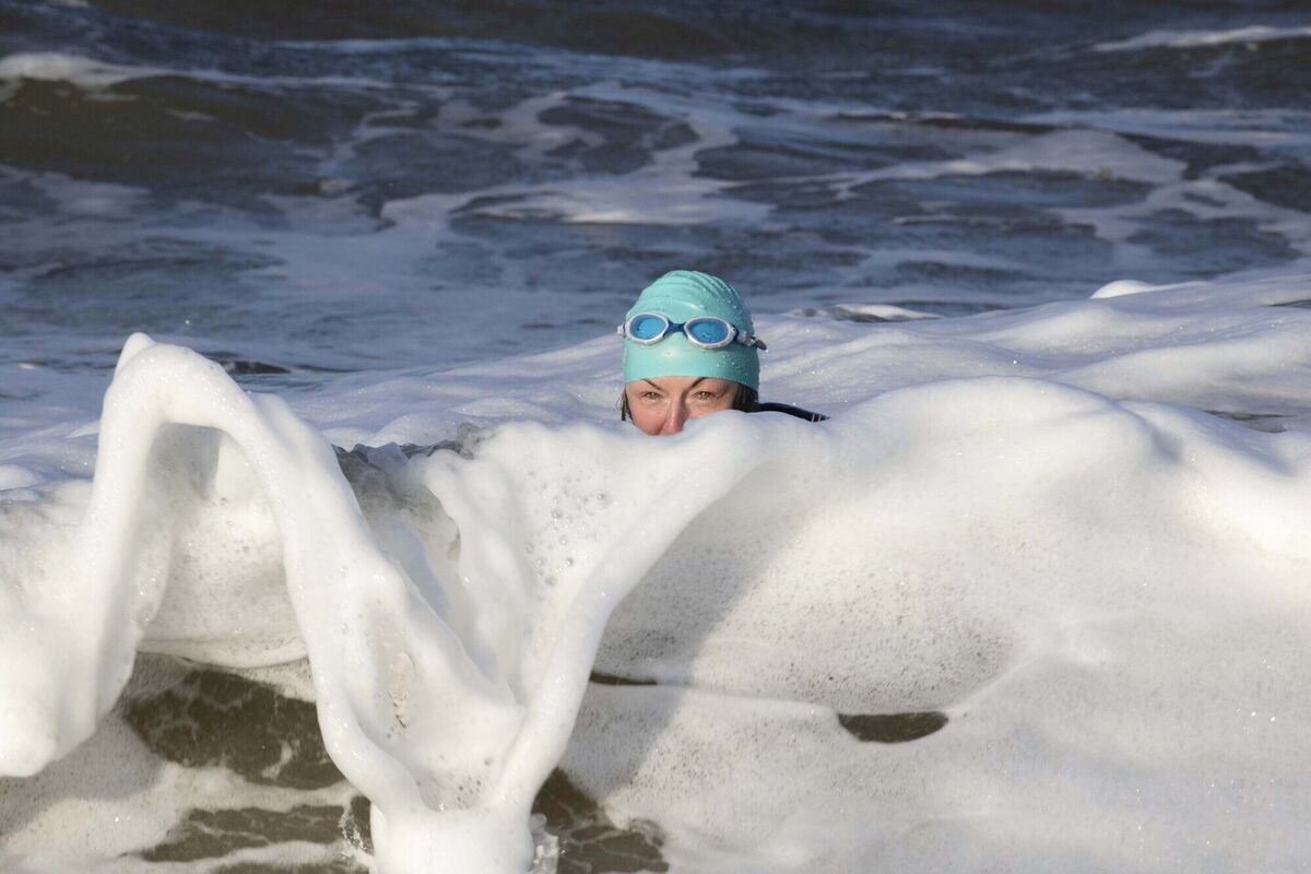 UCC professor Claire Connolly takes to the waves at Rosslare Harbour to mark the end of Ports, Past and Present, a project that celebrates five Irish Sea Ports and the crossings that link them over time and space through stories, films and an innovative app. Picture: Clare Keogh