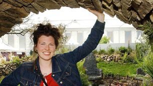 <p class="contextmenu internal_Caption">PIONEER: Gold Award winner Mary Reynolds at the entrance to her Celtic Sanctuary garden at the 2002 Chelsea Flower Show</p>
