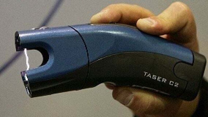 Woman tasered bank official after home was repossessed, court told Woman tasered bank official after home was repossessed, court told