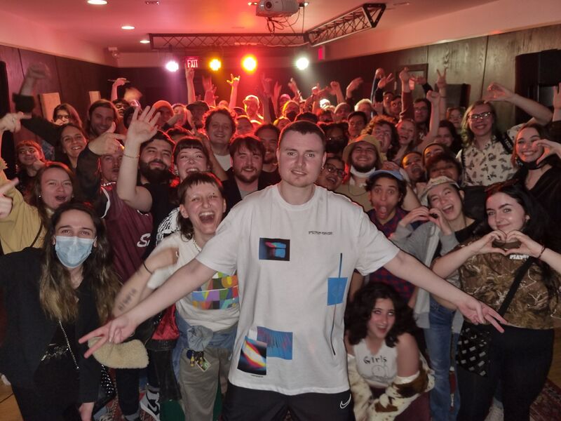 Autistic rapper Craic Boi Mental with fans after a gig in New York City