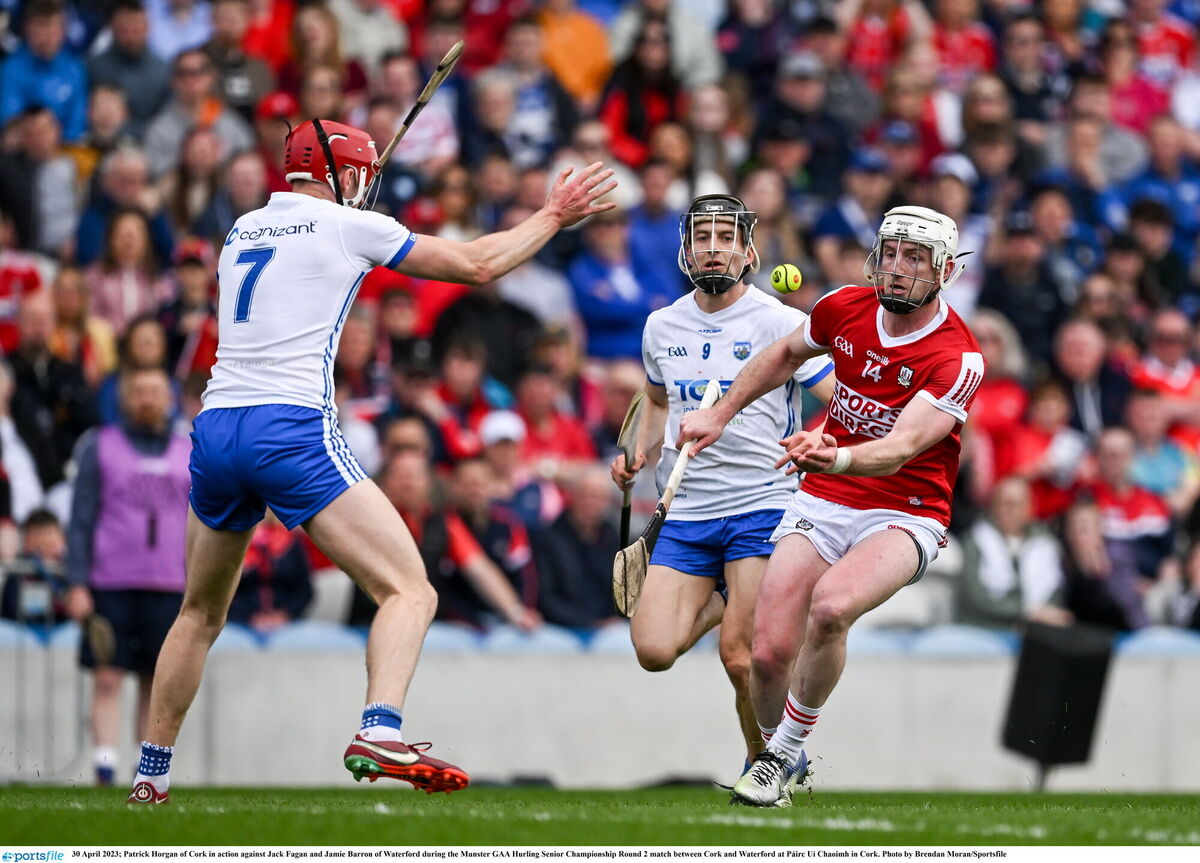 Patrick Horgan of Cork pops a pass from Jack Fagan and Jamie Barron of Waterford. Picture: Brendan Moran/Sportsfile Patrick Horgan of Cork pops a pass from Jack Fagan and Jamie Barron of Waterford. Picture: Brendan Moran/Sportsfile