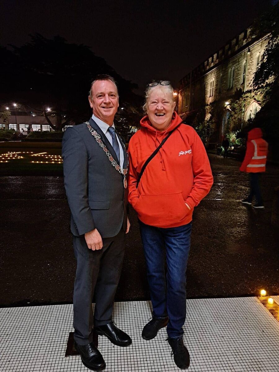 Cllr Fergal Dennehy and Caitríona Twomey, volunteer co-ordinator of Cork Penny Dinners, at the Darkness into Light event at UCC. Picture credit: Mick Finn