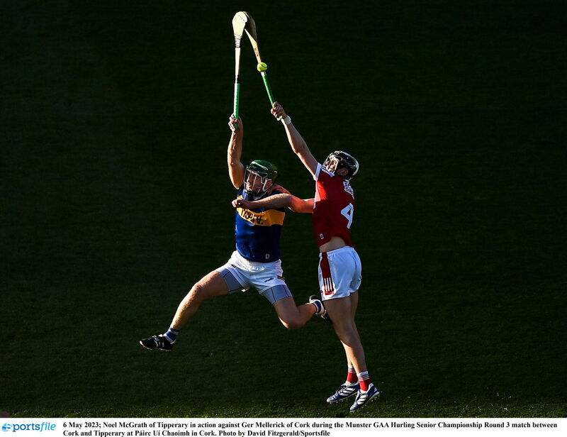 Cork's Ger Millerick and Tipperary's Noel McGrath battle in the air for possession in the Munster SHC game at Páirc Uí Chaoimh. Picture: David Fitzgerald/Sportsfile
