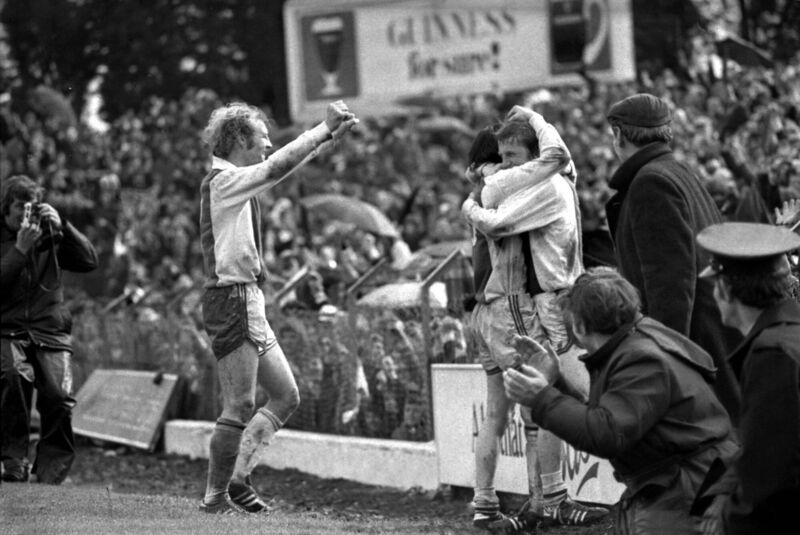 Carl Humphries and Denis Allen celebrate the winning goal. Also included is Sonny Sweeney 