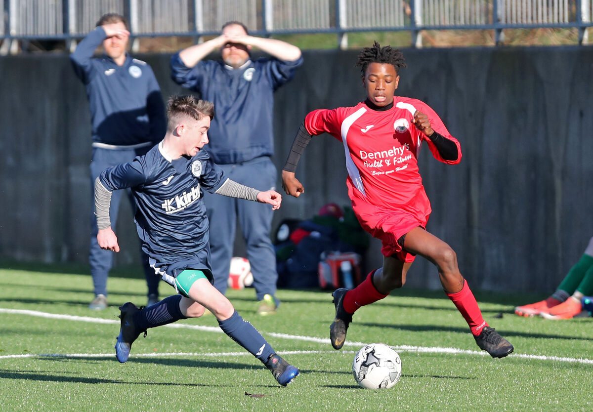  Franco Umeh, Cork Athletic, battling Sean Hartigan, Limerick Desmond. Picture: Jim Coughlan