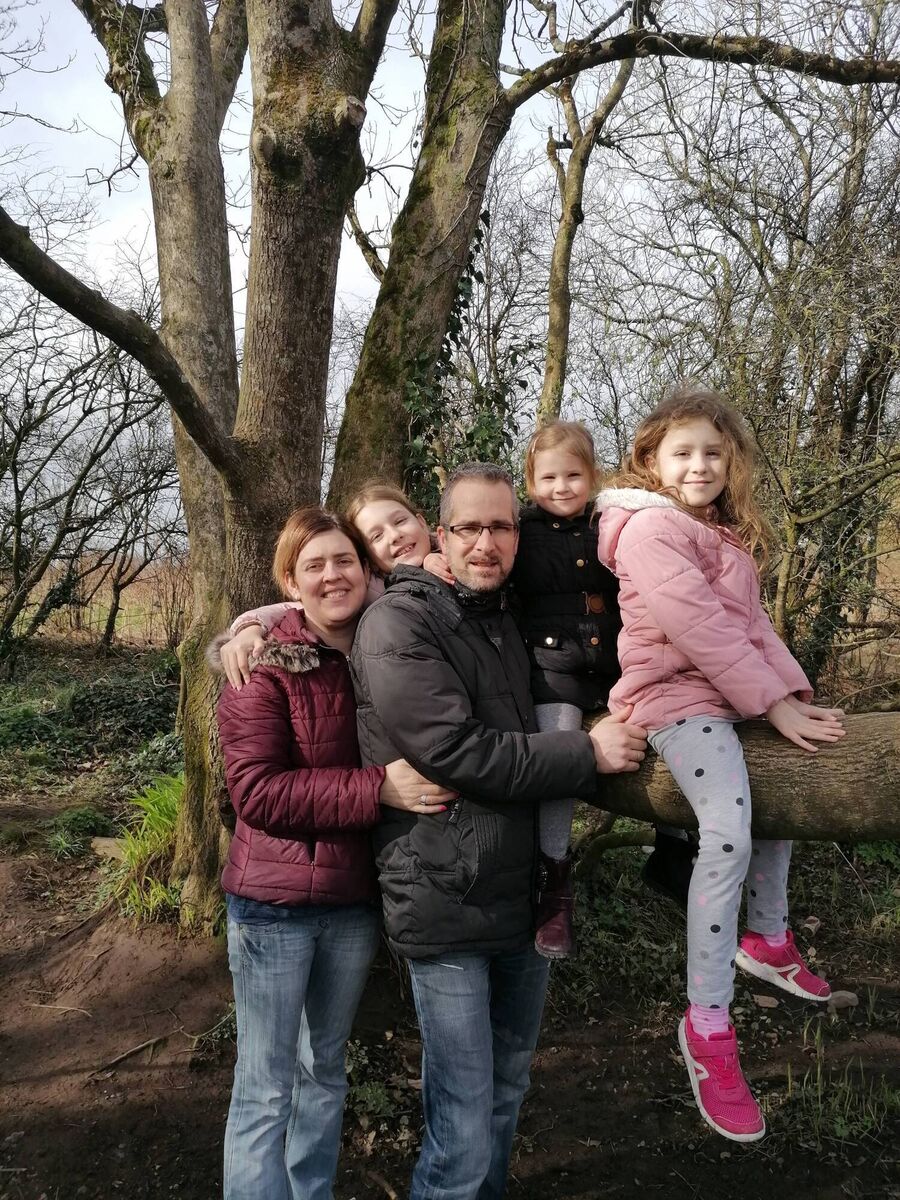 Emma (black jacket) pictured with her parents and older sisters. Emma (black jacket) pictured with her parents and older sisters.