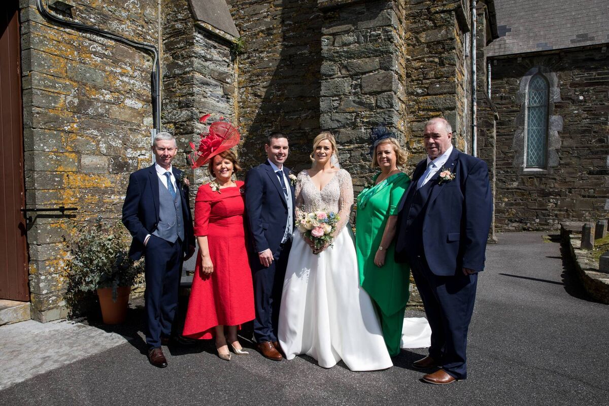 Colm with his mum Pauline and dad Paddy Moran (left) and Rebecca with her dad Robert and step mother Mary Bennett (right).
