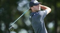 Rookie Austin Eckroat grabs share of lead as Scottie Scheffler falters