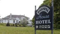 Tánaiste criticises road blockade near former hotel housing asylum seekers in Clare
