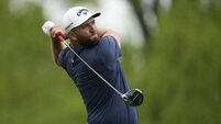 Jon Rahm struggles in heavy rain at start of third round of US PGA Championship