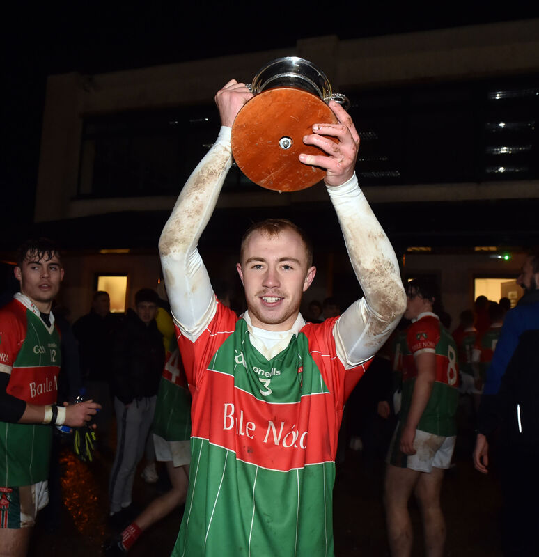 Ballinora captain Ronan Barrow raises the trophy after defeating Valley Rovers in the Rebel Og U18 P2FC final at Cloughduv. Picture: Eddie O'Hare
