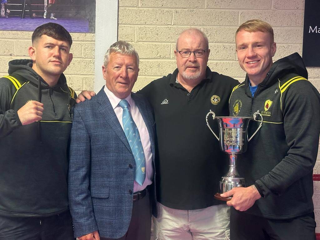 Bibi Long, Dan O'Connell, John Morrissey, and Shane Cunningham with the Club of the Year Cup won by Golden Gloves