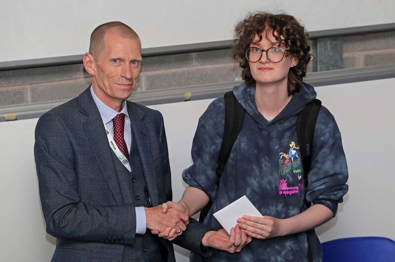 Pictured is John Fitzgibbons, Director of Further Education Cork ETB presenting the 2nd prize to Kaya Holbrook, Cork City Learning Services, for her portrait, at the Youthreach's Got Talent Showcase 2023, staged at the Cork College of FET, Tramore Road Campus, Tramore Road, Cork. Picture: Jim Coughlan. 