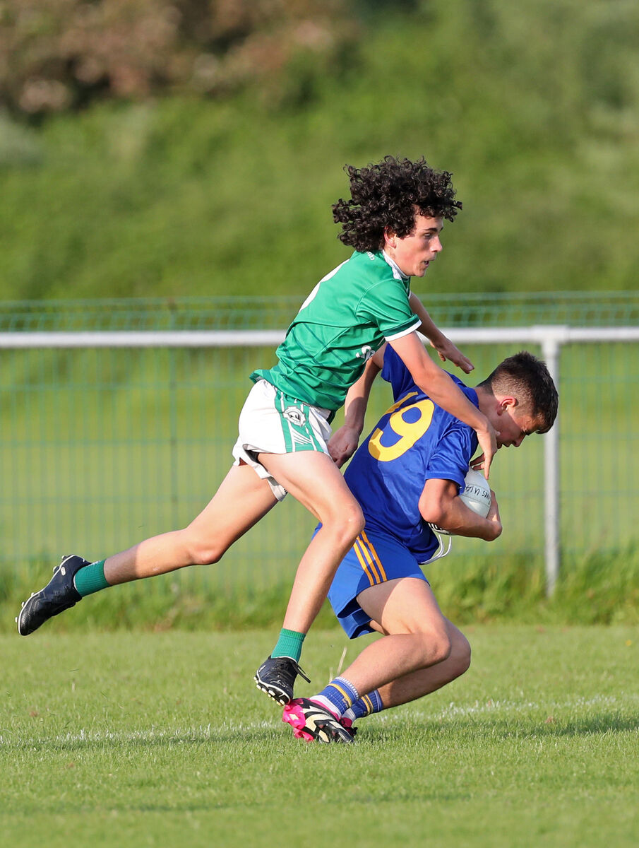  Joe Miskella, Ballincollig, challenges Edmund Burke, St Finbarr's. Picture: Jim Coughlan
