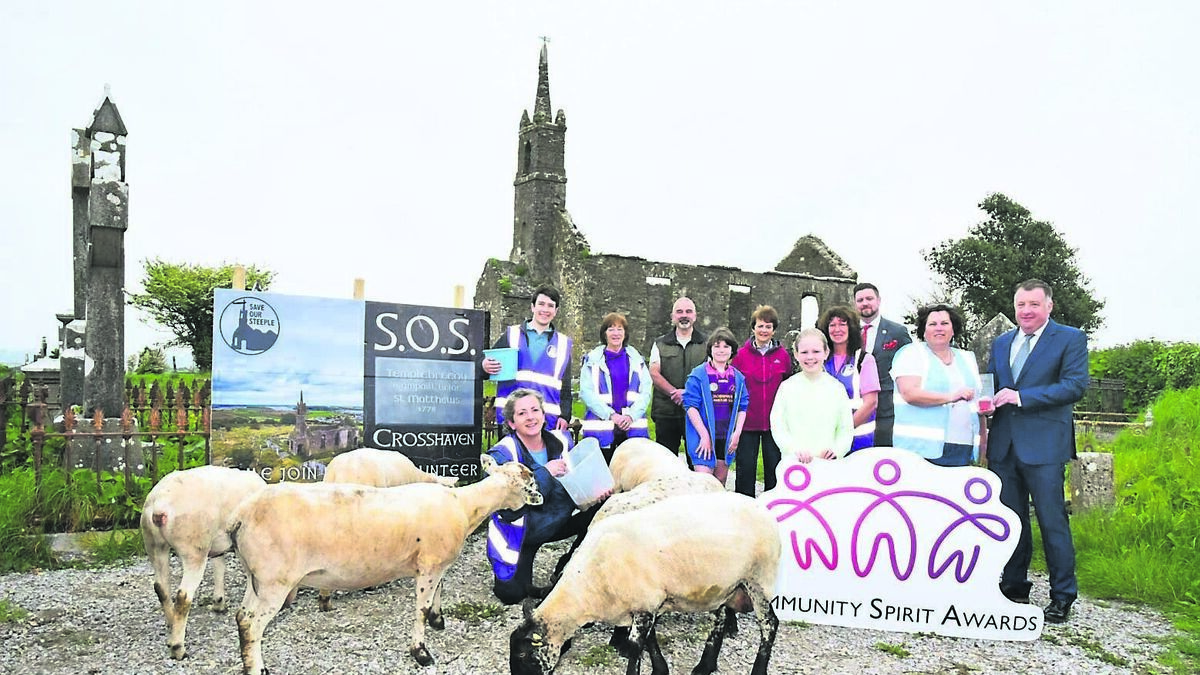 Community award for group who brought sheep and goats in to help uncover historic graves
