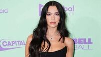 Dua Lipa reveals how she bonded with designer Donatella Versace