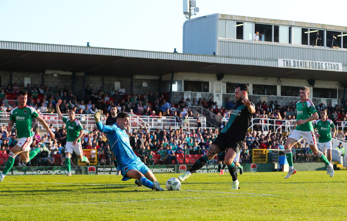 Cork City goalkeeper Jimmy Corcoran makes a save against Shamrock Rovers' Richie Towell. Picture: INPHO/Bryan Keane