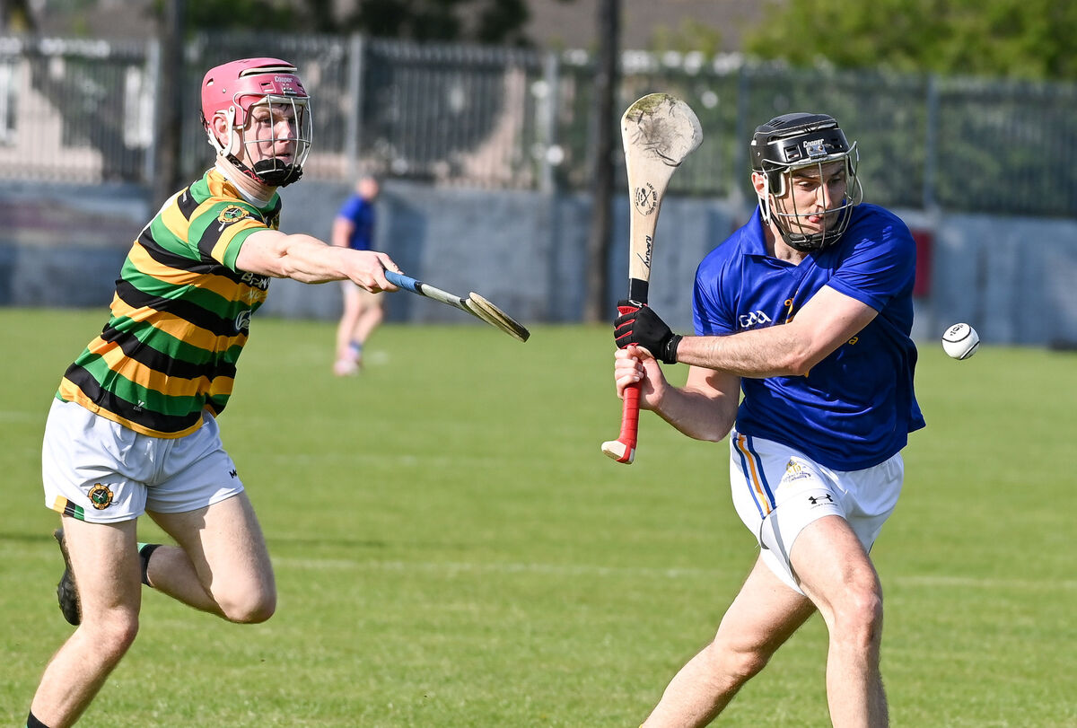 St Finbarr's Brian Ramsey scores a point despite the efforts of Glen Rovers' Donagh Coughlan. Picture: David Keane. St Finbarr's Brian Ramsey scores a point despite the efforts of Glen Rovers' Donagh Coughlan. Picture: David Keane.