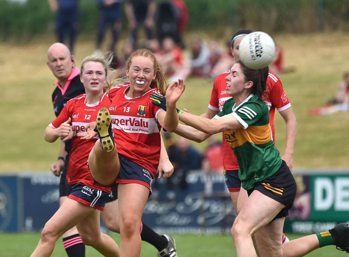 Orlaith Cahalane, Cork gets the ball away while tackled by Eilís Lynch, Kerry in the TG4 Munster LGFA senior football championship final at Mallow, Co Cork. Picture Dan Linehan Orlaith Cahalane, Cork gets the ball away while tackled by Eilís Lynch, Kerry in the TG4 Munster LGFA senior football championship final at Mallow, Co Cork. Picture Dan Linehan