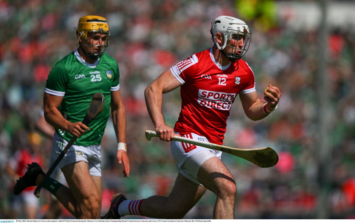 Declan Dalton of Cork with Limerick's Cathal O'Neill in pursuit. Picture: Ray McManus/Sportsfile