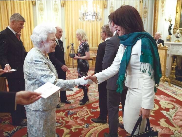 Catherina Casey meeting Queen Elizabeth II.