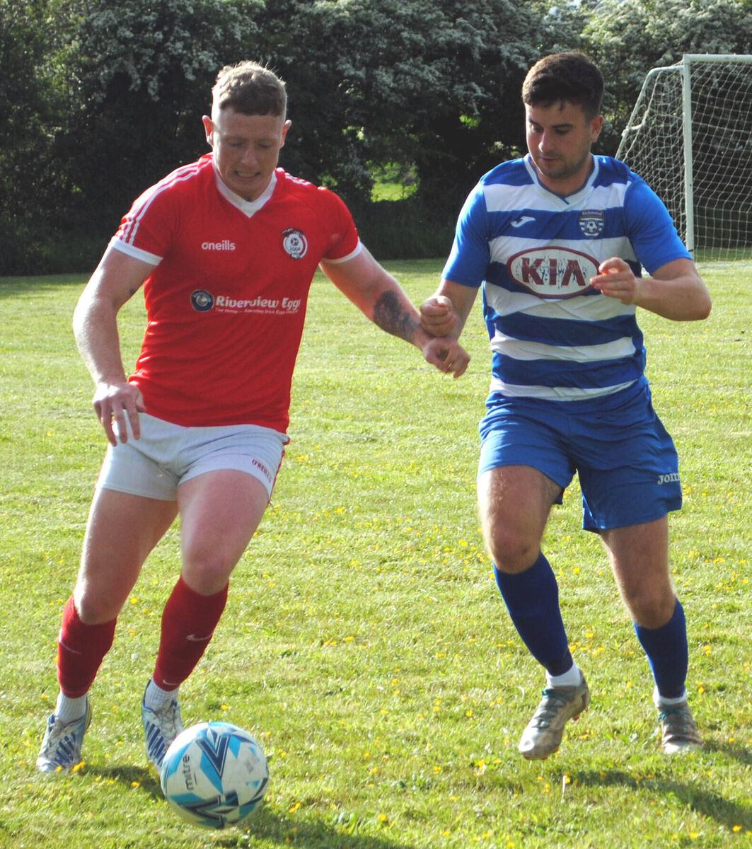 Watergrasshill's Aaron Ricken gets there first over Richmond's Luke Docherty in the action at Killeady. Picture: Barry Peelo.