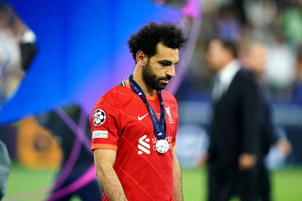 Liverpool's Mohamed Salah looks dejected after collecting his runners-up medal after defeat to Real Madrid in the 2022 UEFA Champions League Final at the Stade de France, Paris. Picture: Adam Davy/PA Wire Liverpool's Mohamed Salah looks dejected after collecting his runners-up medal after defeat to Real Madrid in the 2022 UEFA Champions League Final at the Stade de France, Paris. Picture: Adam Davy/PA Wire