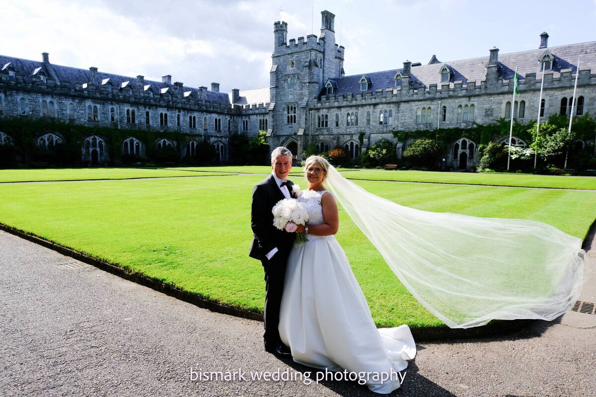 The couple, who stopped off at UCC for some special wedding photographs, said they were delighted to have both sets of parents celebrating their special day with them - Frank and Phil Roche and Ted and Esther Keane.