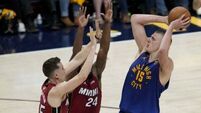 Nikola Jokic triple-double propels Denver Nuggets past Miami Heat 104-93