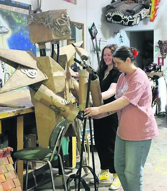 Aisling McCallion and Casey Walsh from the Cork Community Art Link test a puppet Aisling McCallion and Casey Walsh from the Cork Community Art Link test a puppet