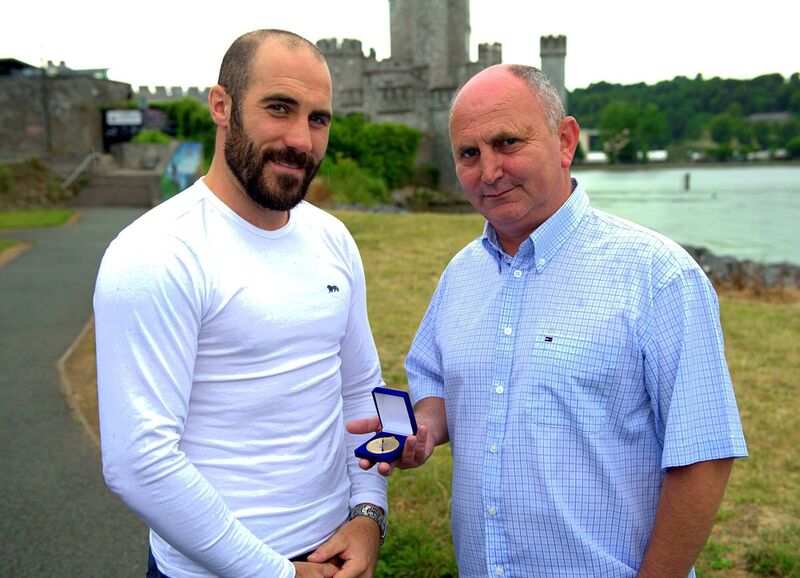 Paddy McSweeney, Secretary of the Cork Ex-Boxers Association, showing off the first casting of their new award, the Jack McAuliffe Medal, to Cork professional boxer Gary 'Spike' O Sullivan. Paddy McSweeney, Secretary of the Cork Ex-Boxers Association, showing off the first casting of their new award, the Jack McAuliffe Medal, to Cork professional boxer Gary 'Spike' O Sullivan.