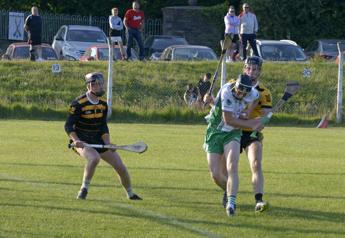 Muskery forward Cian O'Driscoll getting away from Carrigdouns Eoin Lombard. Picture Denis Boyle. Muskery forward Cian O'Driscoll getting away from Carrigdouns Eoin Lombard. Picture Denis Boyle.