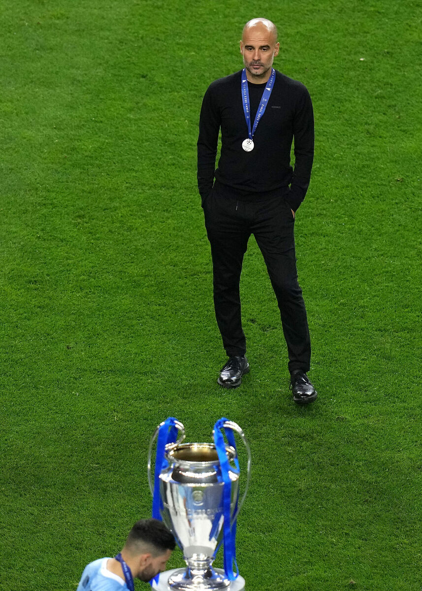 Manchester City manager Pep Guardiola looks on at the trophy after losing the 2021 Champions League final. Winning the cup has been a top objective for Guardiola and City since he took over. Picture:   Adam Davy/PA Wire.