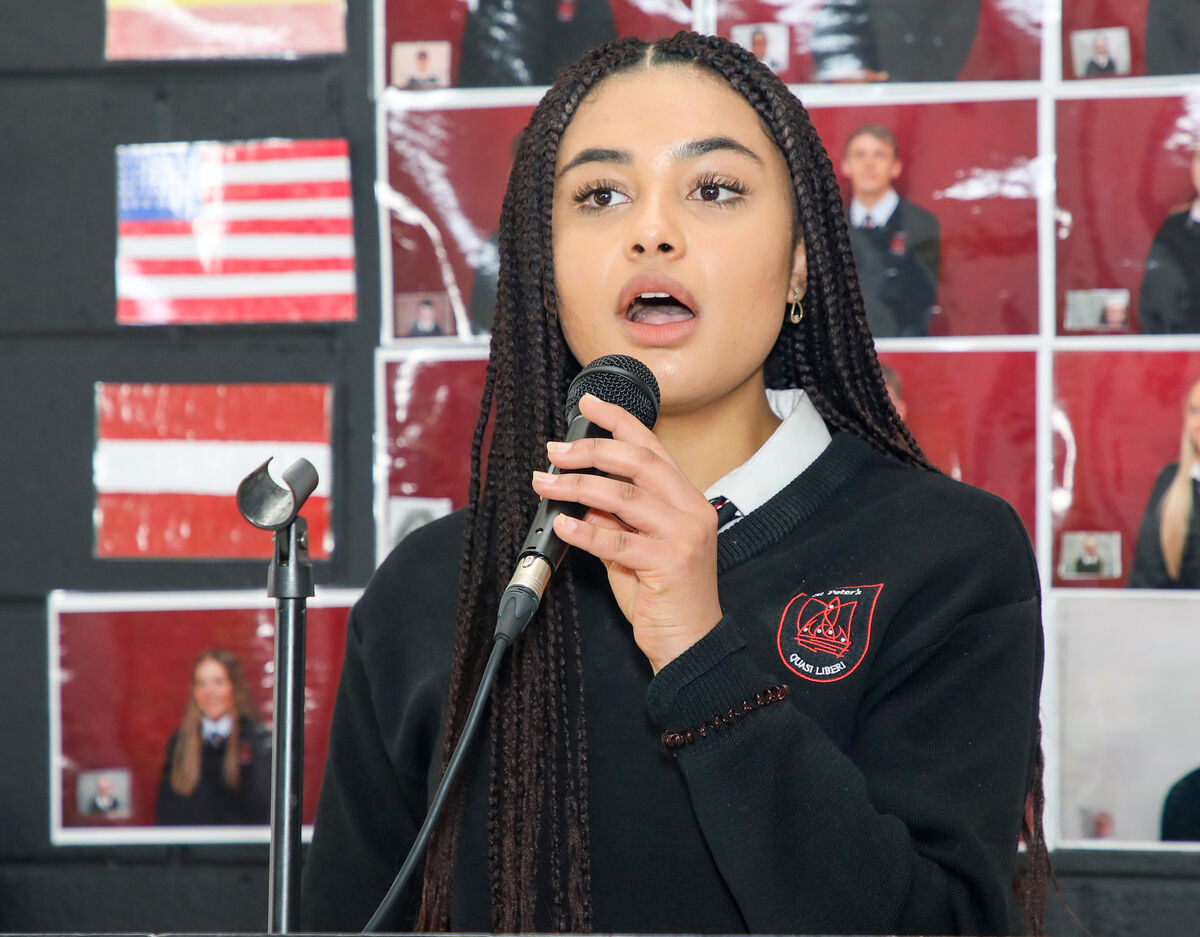 Leaving Cert student Isabella Omoba sings during the mass at the Leaving Cert graduation in St Peter's Community School in Passage West. Picture: David Creedon