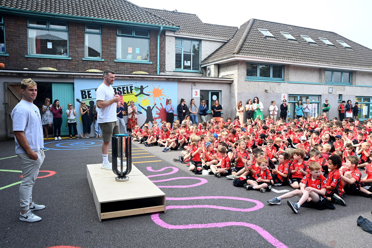 Munster Rugby players (left) Alex Kendellen and Peter O'Mahony brought the United Rugby Championship (URC) trophy to St Anthony's BNS, Ballinlough. Pic: Larry Cummins Munster Rugby players (left) Alex Kendellen and Peter O'Mahony brought the United Rugby Championship (URC) trophy to St Anthony's BNS, Ballinlough. Pic: Larry Cummins