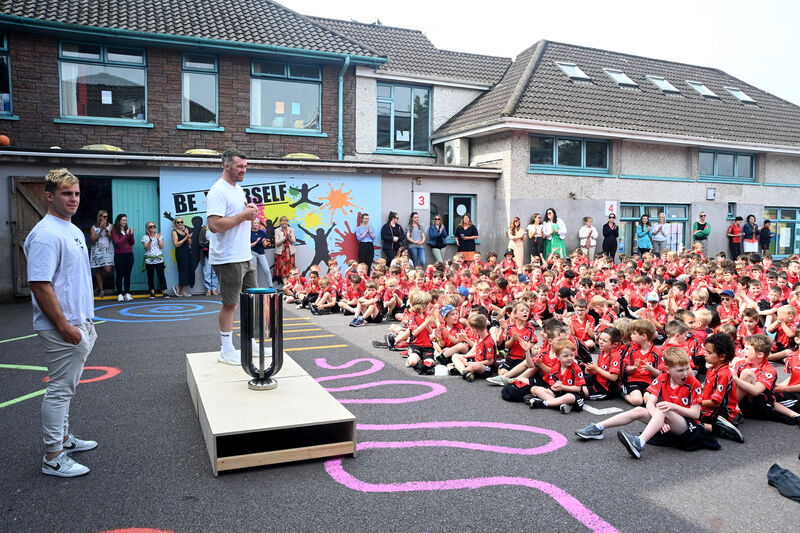 Munster Rugby players (left) Alex Kendellen and Peter O'Mahony brought the United Rugby Championship (URC) trophy to St Anthony's BNS, Ballinlough. Pic: Larry Cummins Munster Rugby players (left) Alex Kendellen and Peter O'Mahony brought the United Rugby Championship (URC) trophy to St Anthony's BNS, Ballinlough. Pic: Larry Cummins