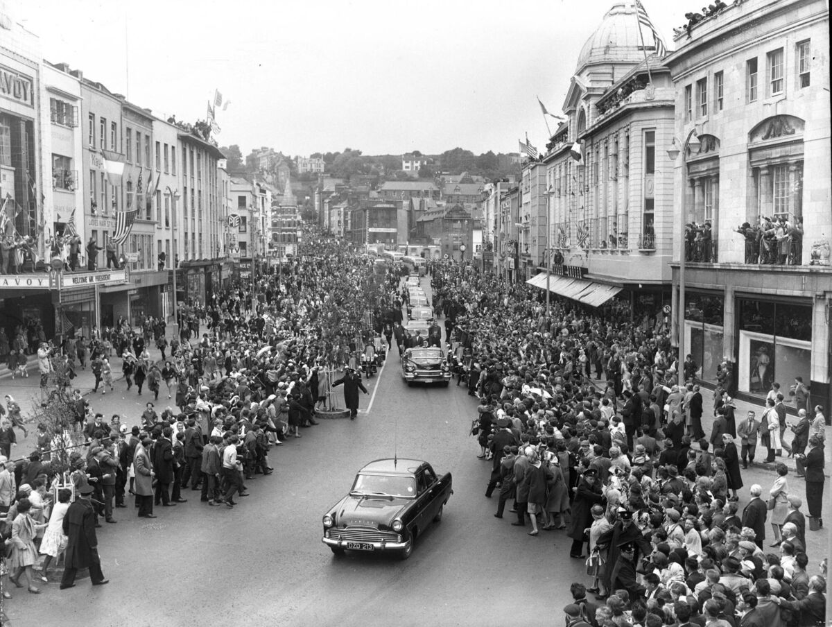 Crowds cheering the US President John F Kennedy on Patrick St. 