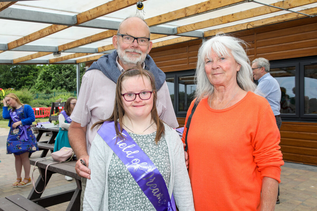 Rebecca Pearson with her parents Stephen and Peg at the graduation ceremony for the Ready 2 Work programme at the Down Syndrome Cork Field of Dreams, Curraheen, Cork. - Picture; David Creedon